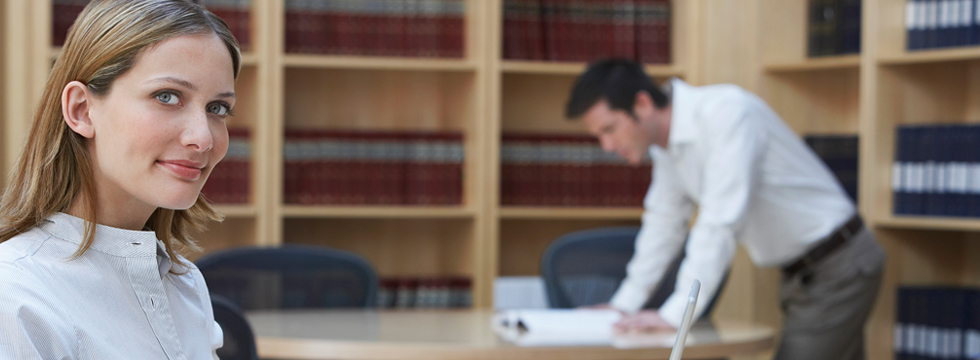 Woman and man in library